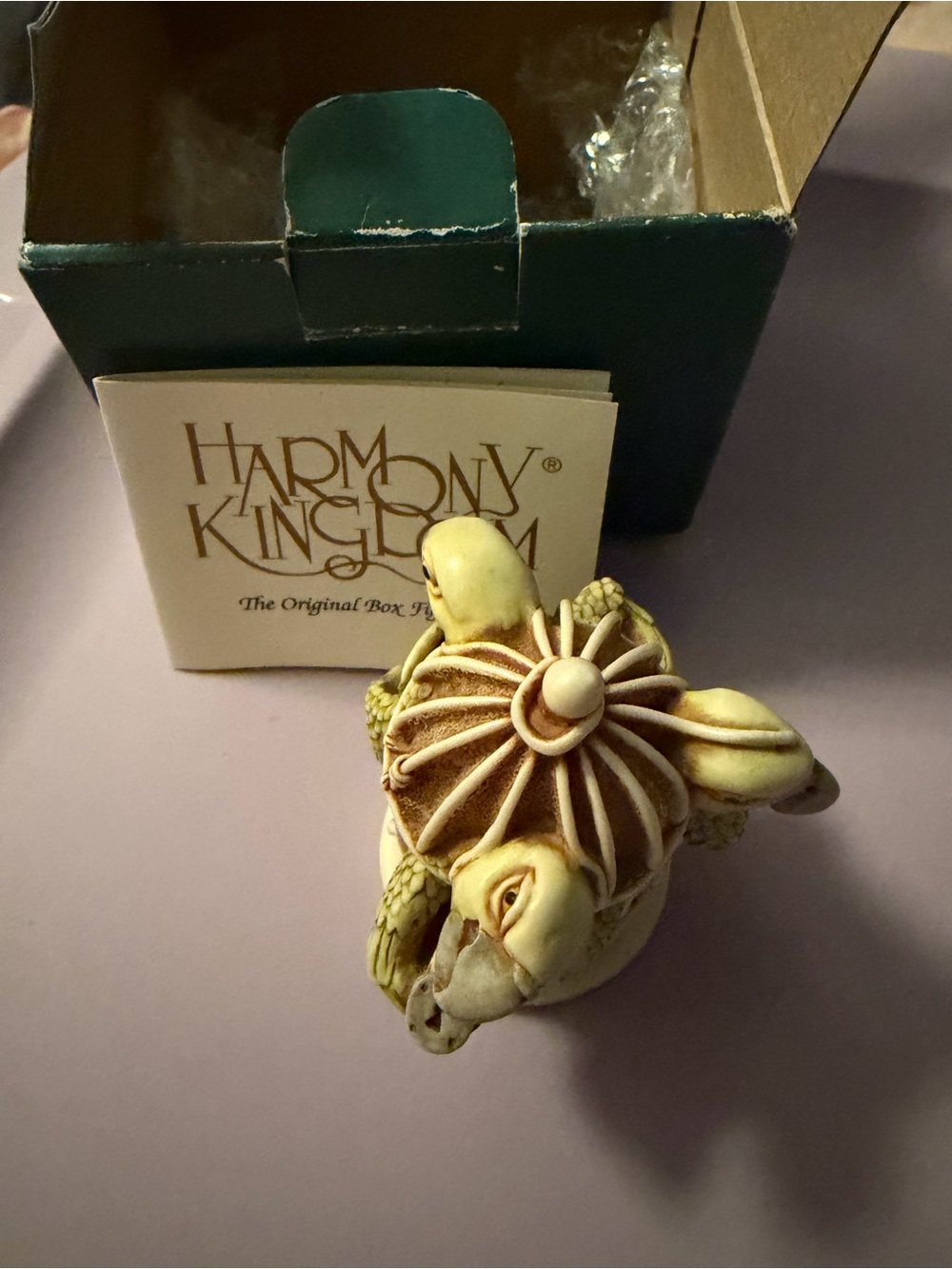Harmony Kingdom parrots the great escape  Figurine in Cream and Brown